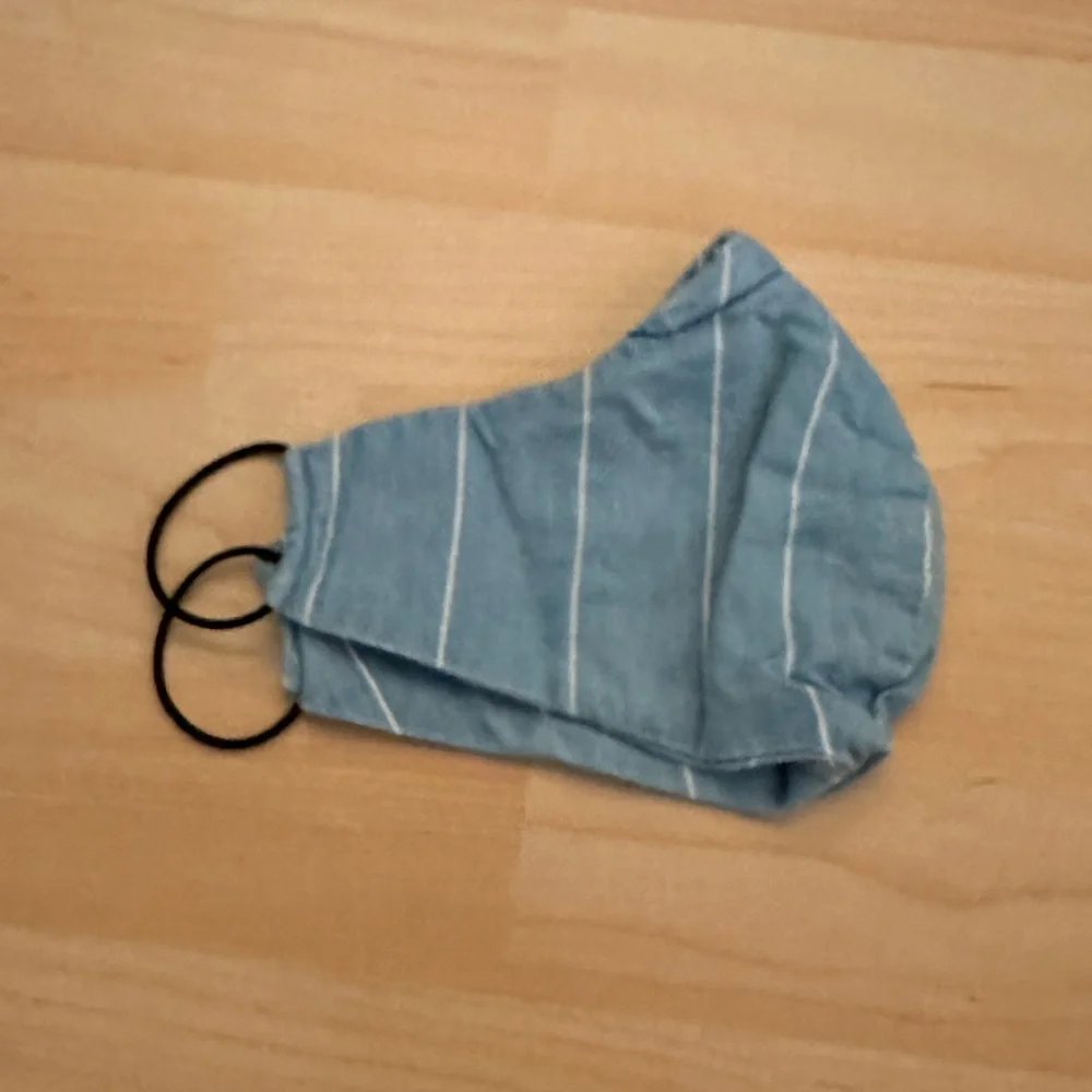 Blue and white striped face mask